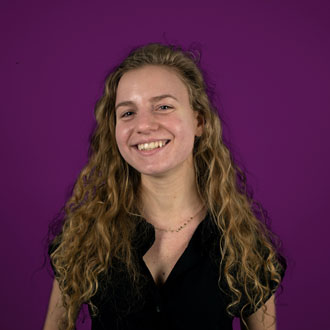 Juana Capelluto's headshot with smile